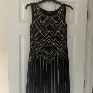 Woman's embellished White House Black Market Dress Size XS